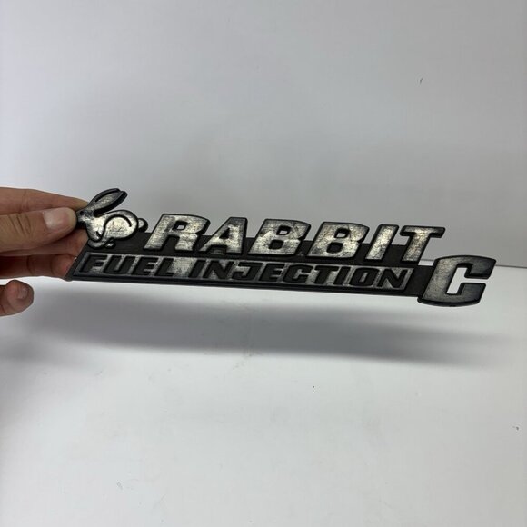75 76 77 78 79 80 81 82 83 84 VW RABBIT C REAR EMBLEM LOGO BADGE USED OEM A24234 - Picture 2 of 5